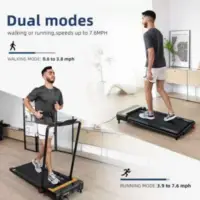 a man on a treadmill. Incline Treadmill.